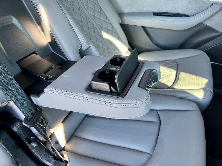2024-audi-q7-55-s-line-2nd-row-drop=down-center console-carpro
