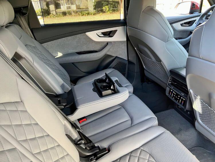 2024-audi-q7-55-s-line-wide-2nd-row-drop=down-center console-carpro.jpg