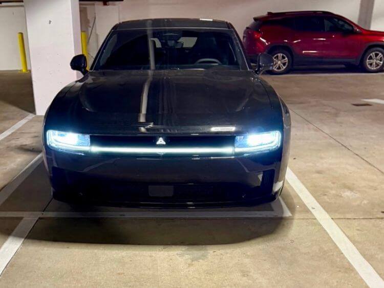 2024-dodge-charger-scatpack-ev-headlights-garage.jp