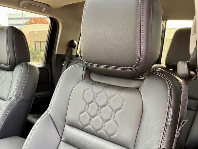 2025-nissan-frontier-sl-seat-closeup-carpro-1